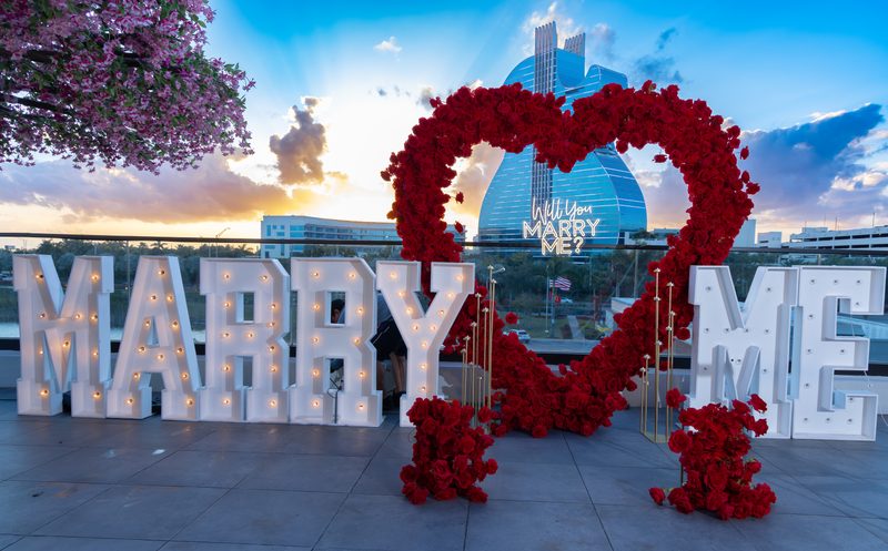 MARRY ME sign at sunset